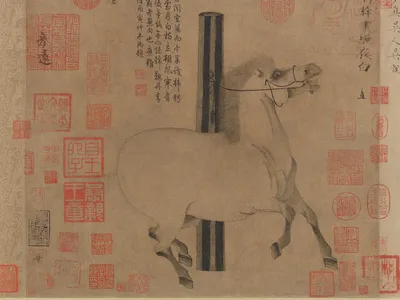 唐代《照夜白》：一匹系在木桩上的白马，四蹄腾跃、鬃毛飞扬